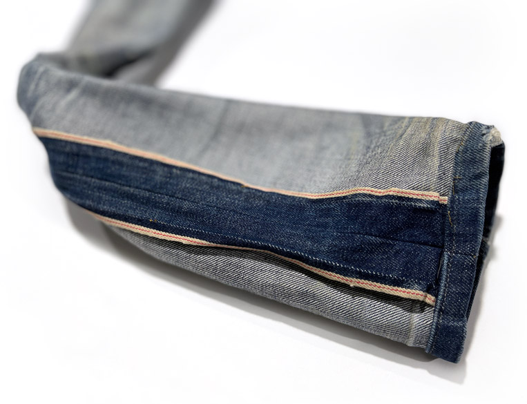 Badly tailored selvedge jeans tapered from outseam 
