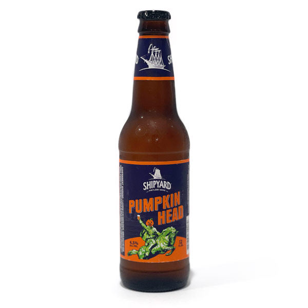A 12-ounce bottle of Shipyard Pumpkinhead Ale for review of the best pumpkin beers in the Denim Beer Machines and Coffee blog