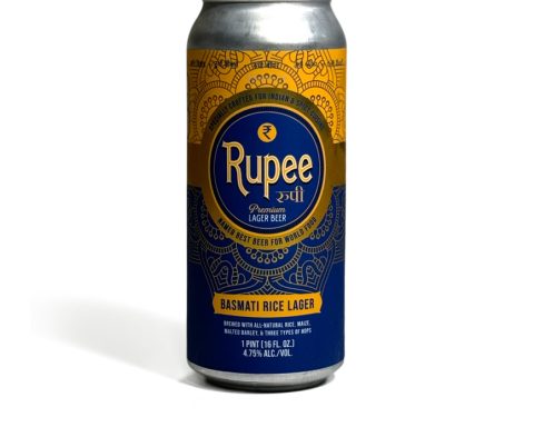 A can of Rupee Basmati Rice Lager with a blue and gold design on a white background.