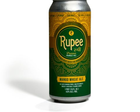 A can of Rupee Mango Wheat Ale with a green and gold design on a white background.