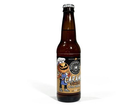 This image displays a 12 oz bottle of Southern Tier Brewing Company’s Caramel Pumking Imperial Pumpkin Ale, highlighting the label’s distinct pumpkin-themed design. The beer, known for its strong caramel, pumpkin, and spice flavors, has a higher alcohol content (8.6% ABV) and appeals to those who enjoy sweet, dessert-like beers. The pumpkin-headed mascot on the label emphasizes the playful and seasonal aspect of this imperial ale.