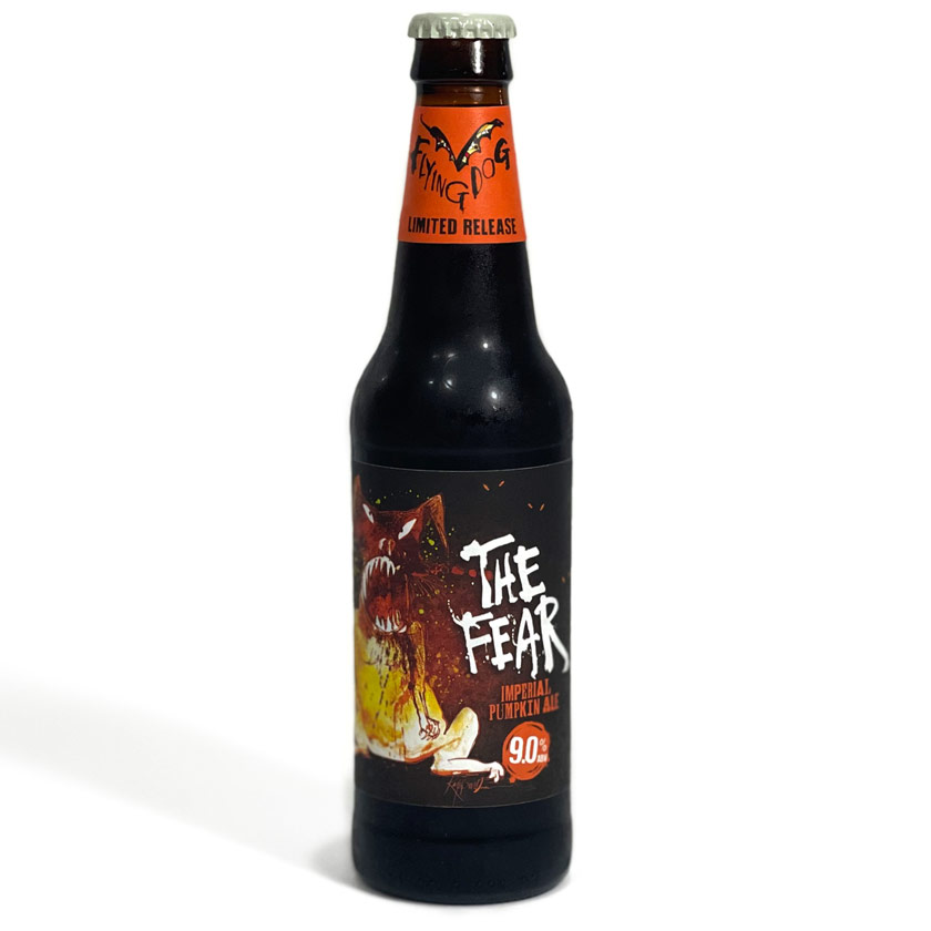 12 oz bottle of Flying Dog Brewery’s The Fear Imperial Pumpkin Ale against a white background, showcasing its vibrant label with a snarling dog illustration.