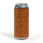 A 16 oz can of Scythe Pumpkin Ale by The Drowned Lands Brewery. The can is earthy orange with minimalist line art and text, describing it as a 5.7% ABV Foeder Fermented Pumpkin Ale brewed in Warwick, NY.