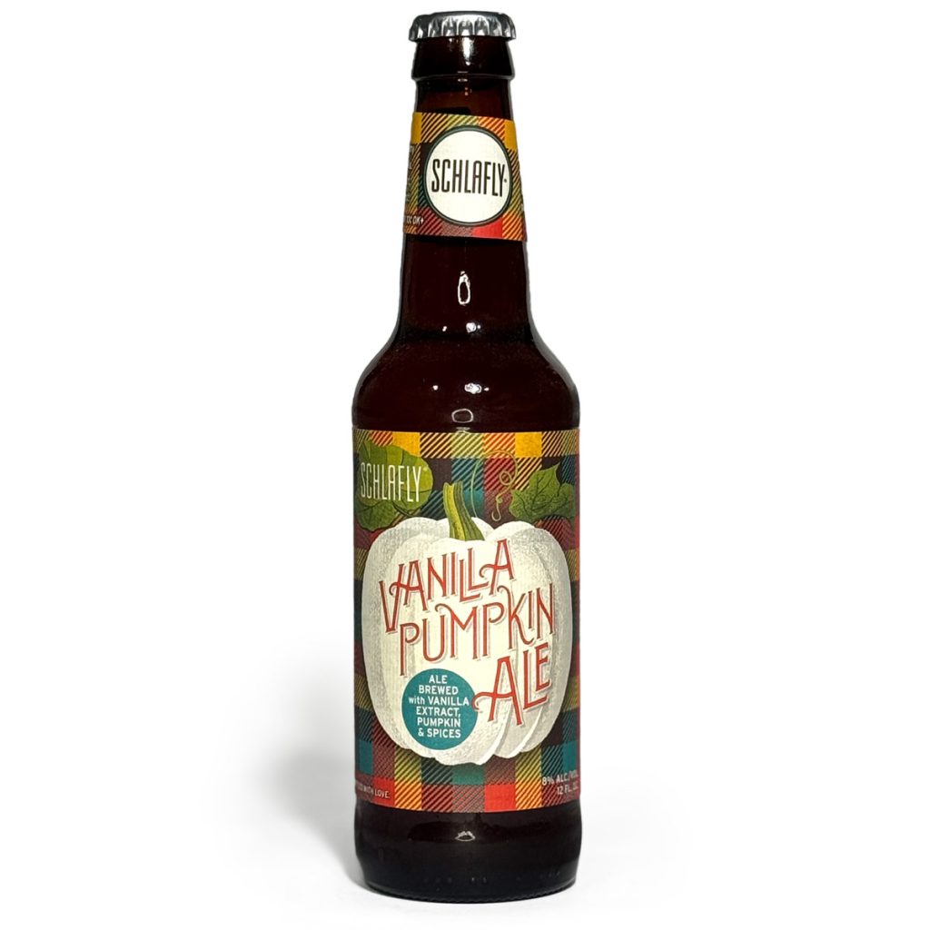 Photo of Schlafly Vanilla Pumpkin Ale beer in a 12 oz. bottle. The label features a white pumpkin with red and cream typography over a plaid fall background. The bottle cap is silver with the Schlafly logo.